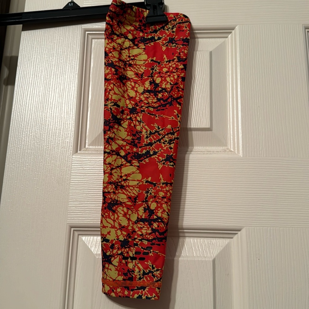 Orange/yellow/black basketball shooter sleeve